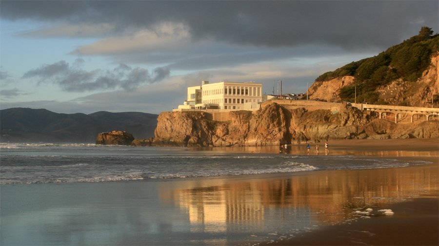 Historic multi-story Victorian Cliff House in San Francisco overlooking Ocean Beach in the late nineteenth century
