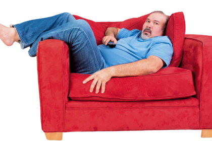 A modern corporate office worker sitting at a desk with conceptual health risk graphics representing sedentary behavior risks