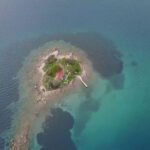 Aerial view of Daskalio islet near Keros, Greece, showing its natural pyramid shape and ancient stone terraces